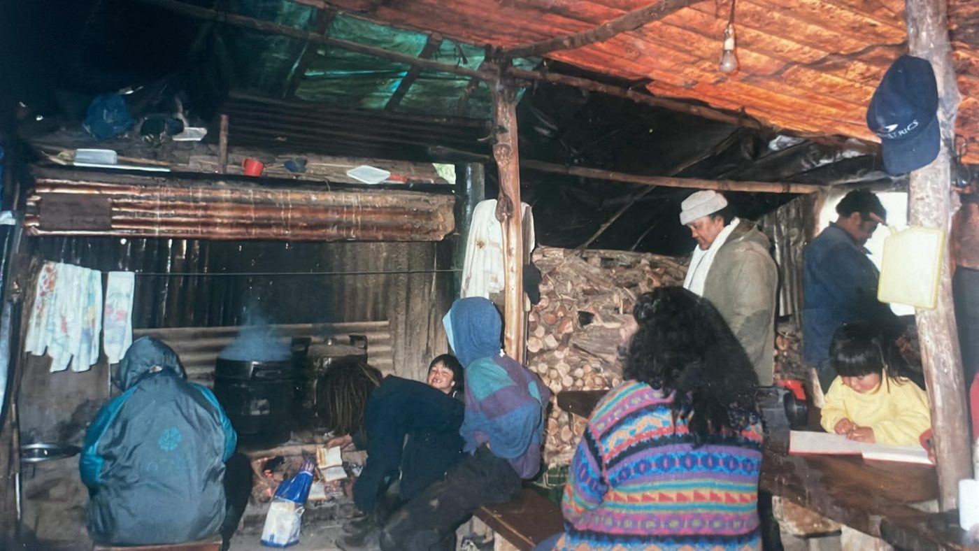 Whānau and tamariki inside the cookhouse at Tieke during the occupation